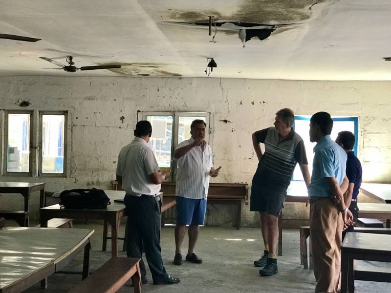 roof damage to school caused by storm